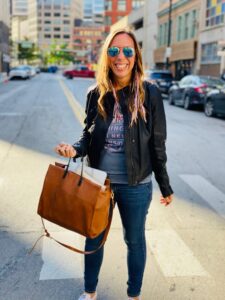 smiling woman on a street