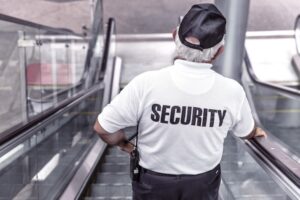 security man on escalator